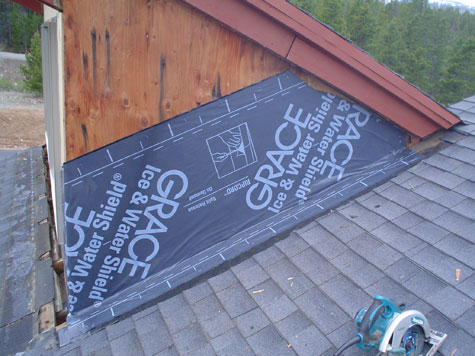 Sealing the side and corner of the dormer.