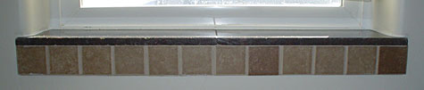 Tiled windowsill by Antique Design Carpentry