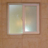 Fixture install and tub installation in a Breckenridge bath remodel project.