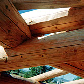 Careful craftsmanship: high quality timberwork and notching of log beams.